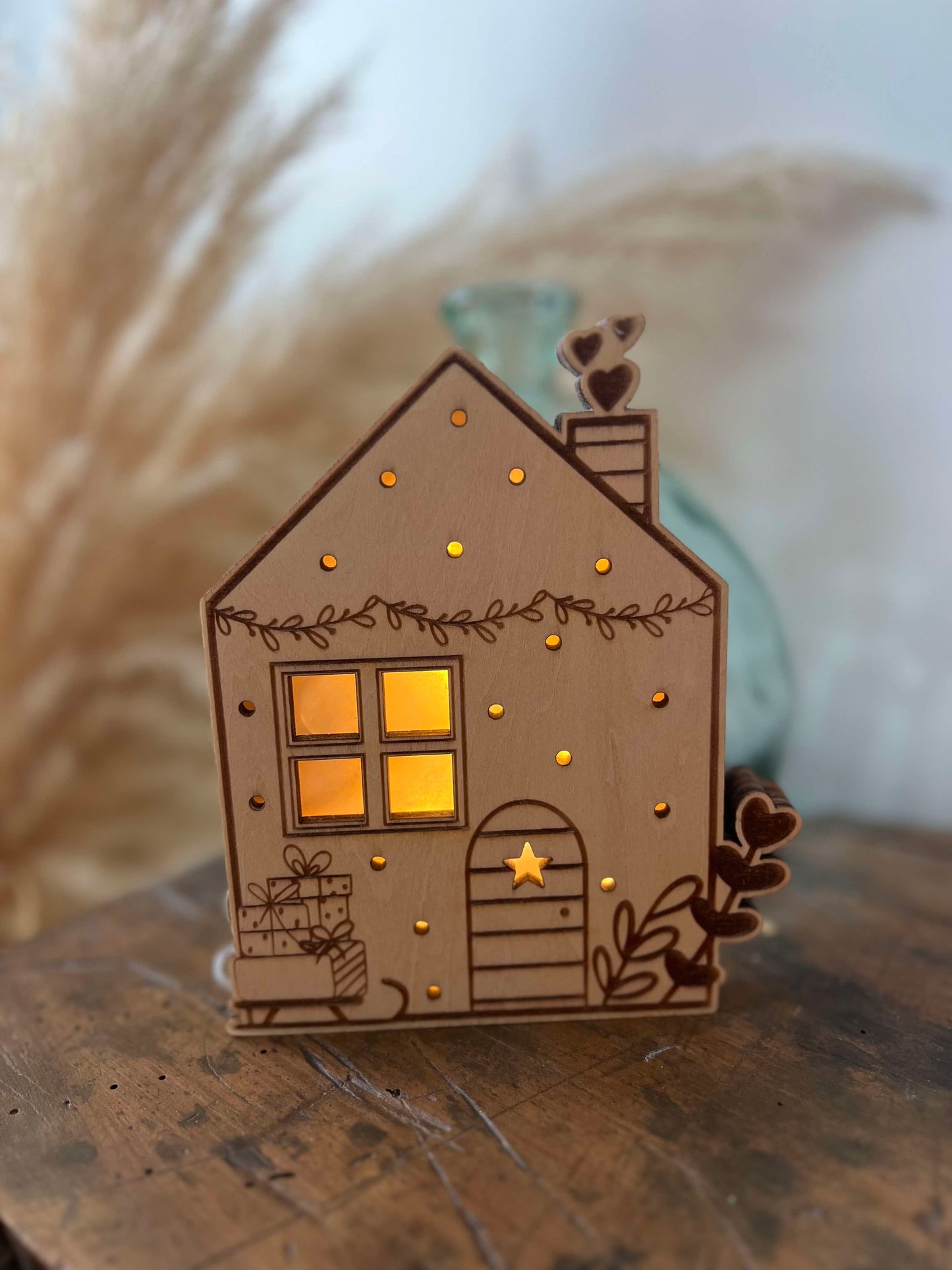 Maisons de Noël lumineuses et traineau