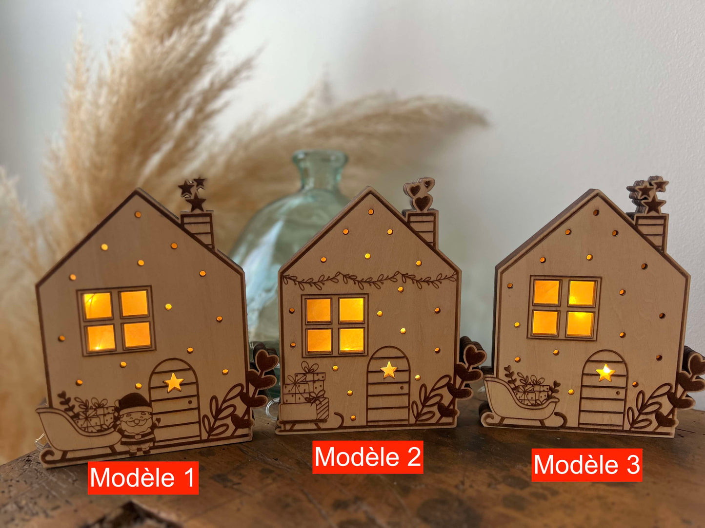 Maisons de Noël lumineuses et traineau